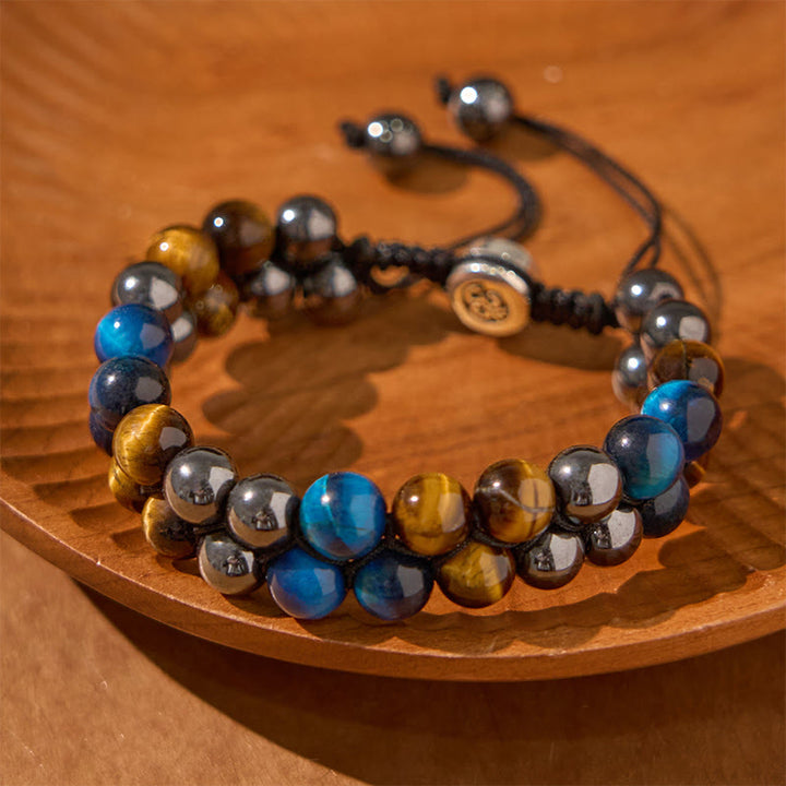 Braccialetto di forza con perline a doppia fila, motivo Om, in occhio di tigre blu naturale e magnetite nera con Buddha Stones