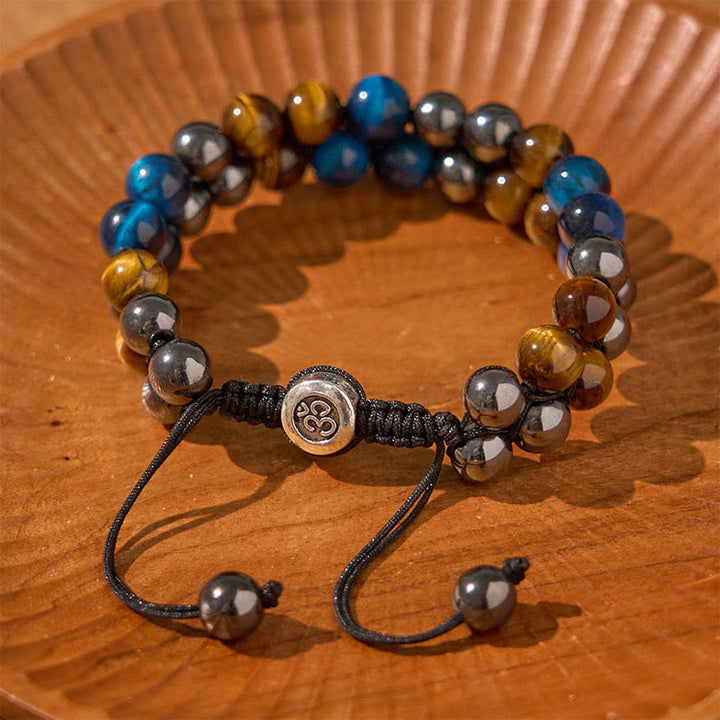 Braccialetto di forza con perline a doppia fila, motivo Om, in occhio di tigre blu naturale e magnetite nera con Buddha Stones