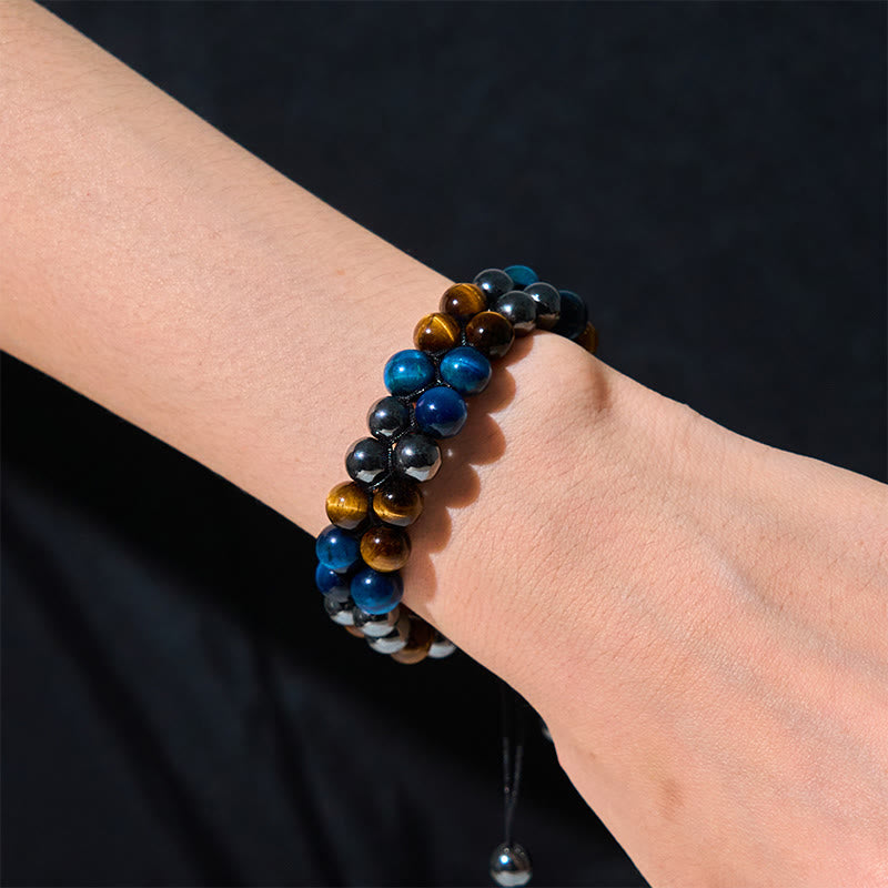 Braccialetto di forza con perline a doppia fila, motivo Om, in occhio di tigre blu naturale e magnetite nera con Buddha Stones