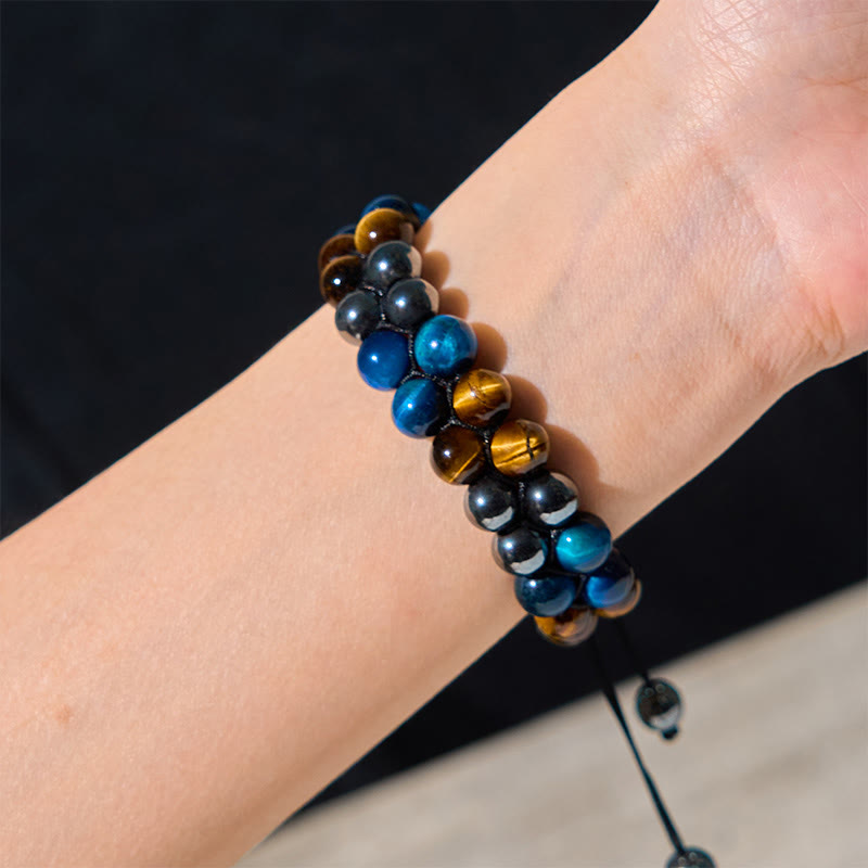 Braccialetto di forza con perline a doppia fila, motivo Om, in occhio di tigre blu naturale e magnetite nera con Buddha Stones