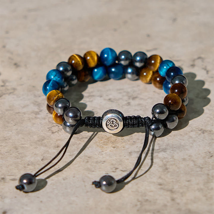 Braccialetto di forza con perline a doppia fila, motivo Om, in occhio di tigre blu naturale e magnetite nera con Buddha Stones