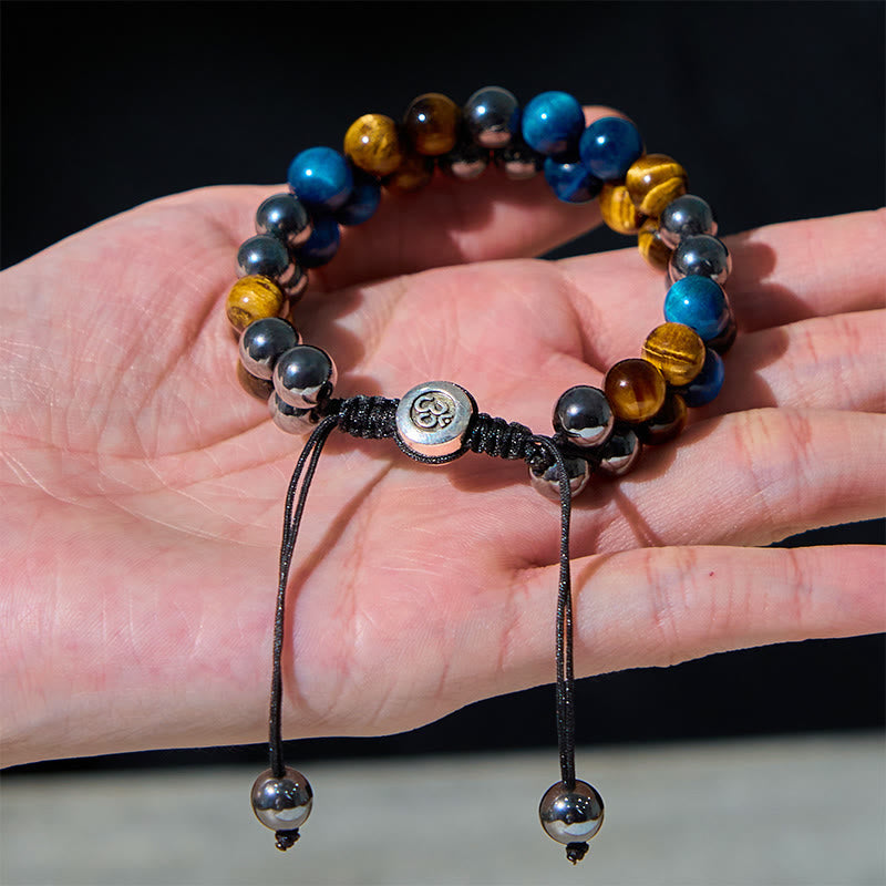 Braccialetto di forza con perline a doppia fila, motivo Om, in occhio di tigre blu naturale e magnetite nera con Buddha Stones
