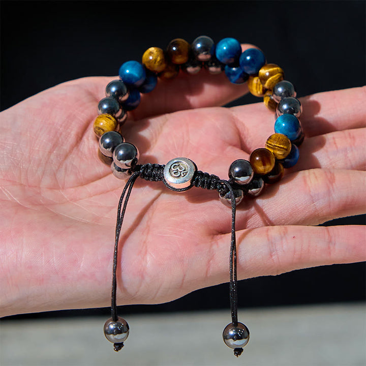Braccialetto di forza con perline a doppia fila, motivo Om, in occhio di tigre blu naturale e magnetite nera con Buddha Stones