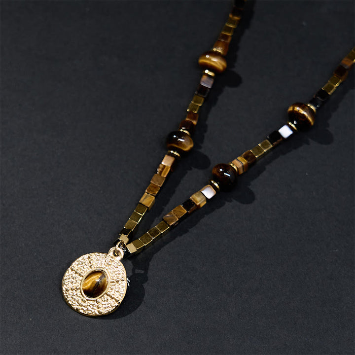 Collana con ciondolo in acciaio al titanio con protezione quadrata in occhio di tigre naturale Buddha Stones