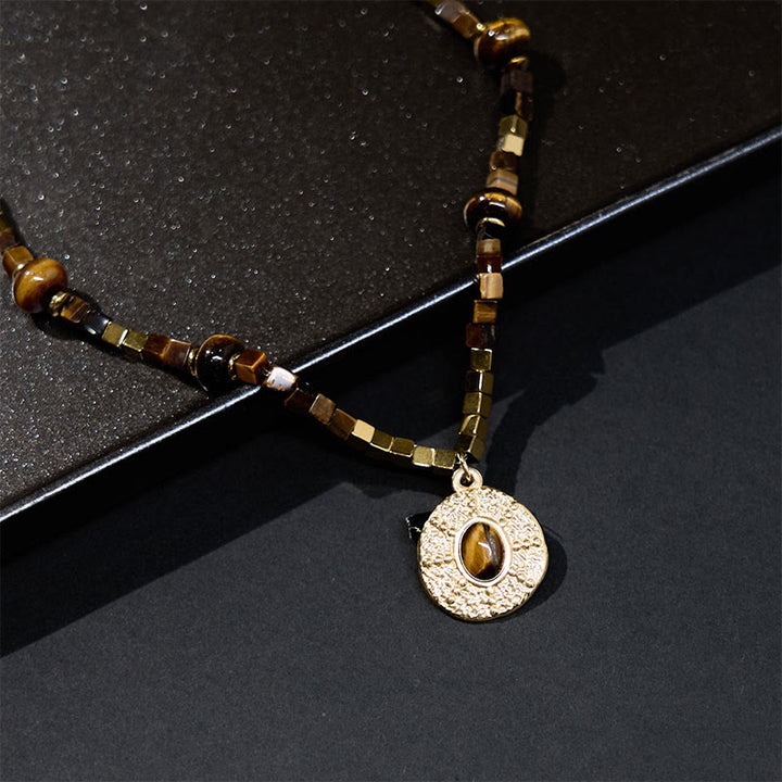 Collana con ciondolo in acciaio al titanio con protezione quadrata in occhio di tigre naturale Buddha Stones