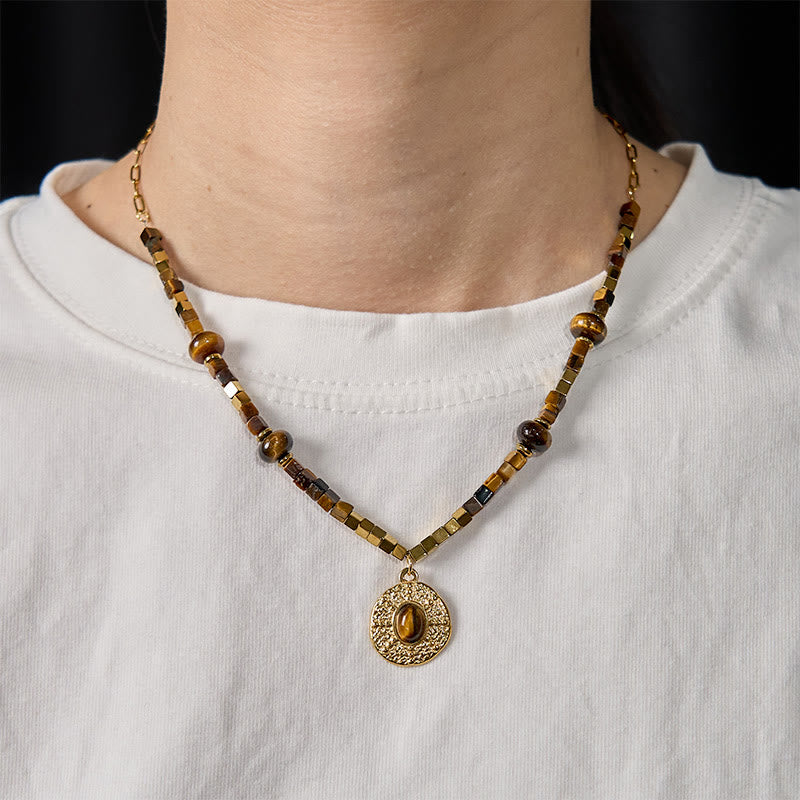 Collana con ciondolo in acciaio al titanio con protezione quadrata in occhio di tigre naturale Buddha Stones