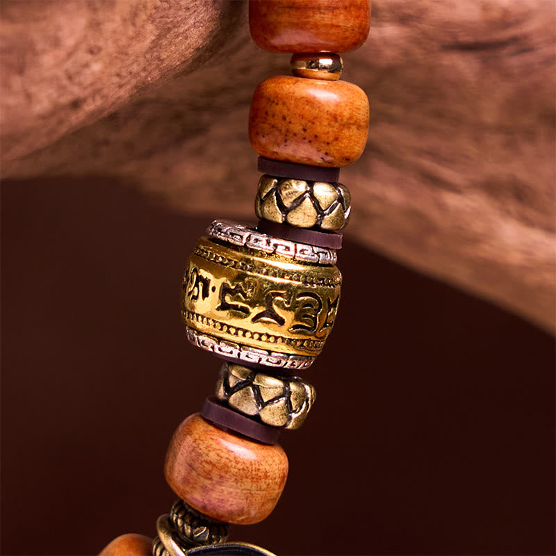 Braccialetto di protezione dalla fortuna in sanscrito OM con perline di osso di cammello tibetano naturale di Buddha Stones