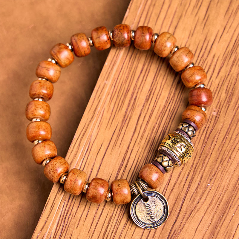 Braccialetto di protezione dalla fortuna in sanscrito OM con perline di osso di cammello tibetano naturale di Buddha Stones