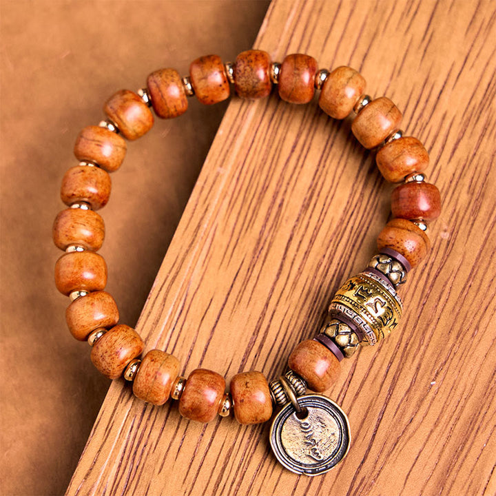 Braccialetto di protezione dalla fortuna in sanscrito OM con perline di osso di cammello tibetano naturale di Buddha Stones