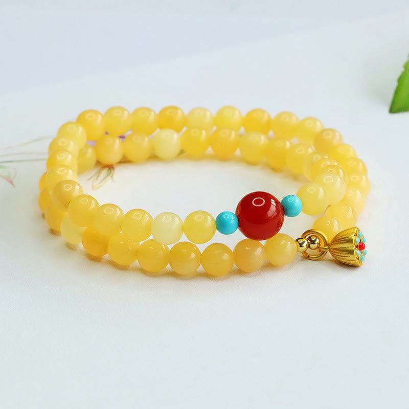Bracciale della fortuna con perline di agata rossa e topazio Buddha Stones