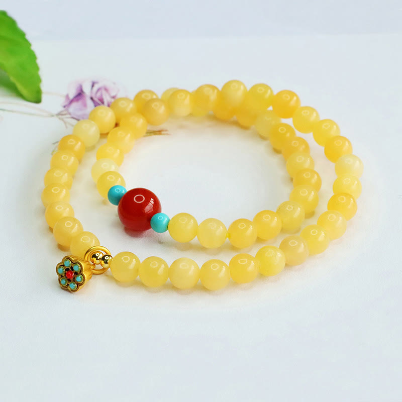 Bracciale della fortuna con perline di agata rossa e topazio Buddha Stones