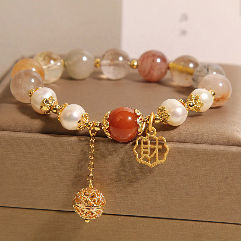 Bracciale Buddha Stones in quarzo rutilato naturale con perle che attraggono fortuna e ricchezza