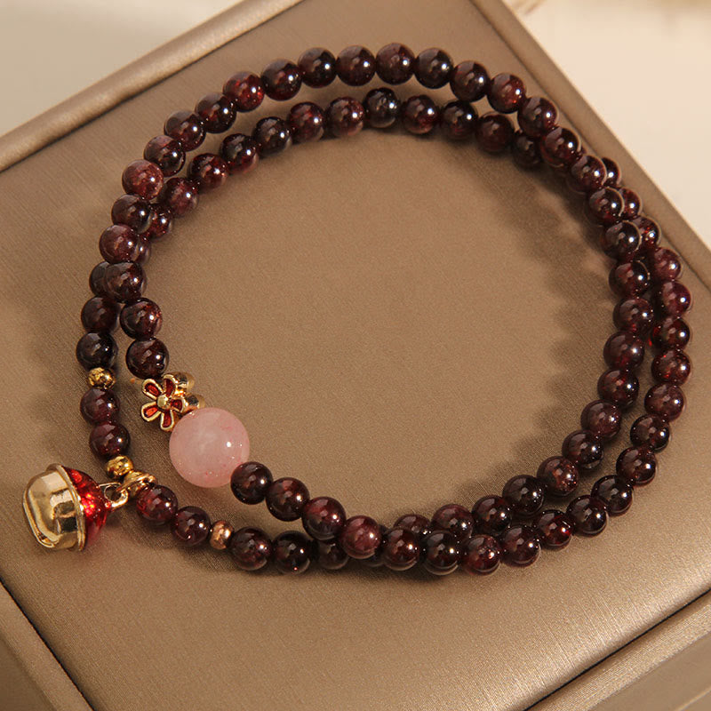 Braccialetto di protezione con campanella a forma di fiore, perline di quarzo rosa granato ultrasottili naturali da 3 mm Buddha Stones