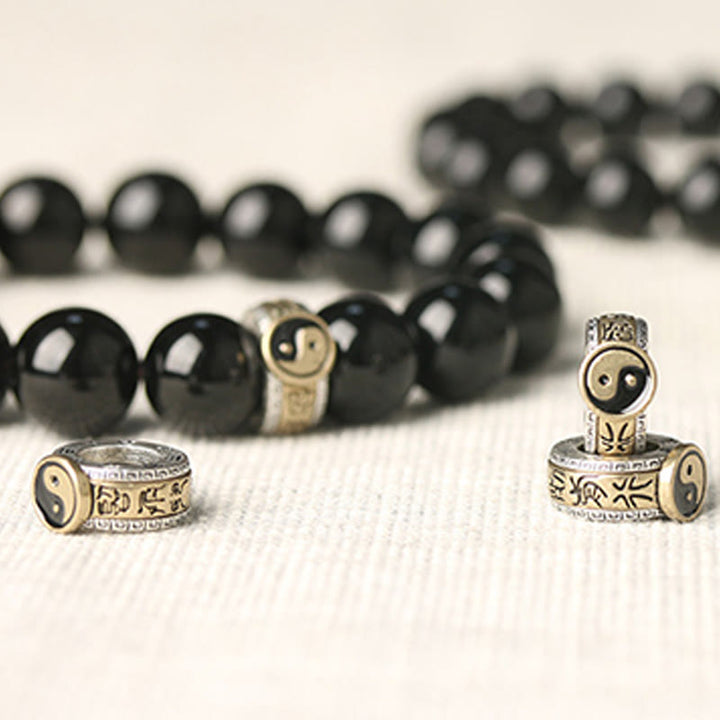 Braccialetto di adempimento del mantra dei nove caratteri Yin Yang in ossidiana nera Buddha Stones
