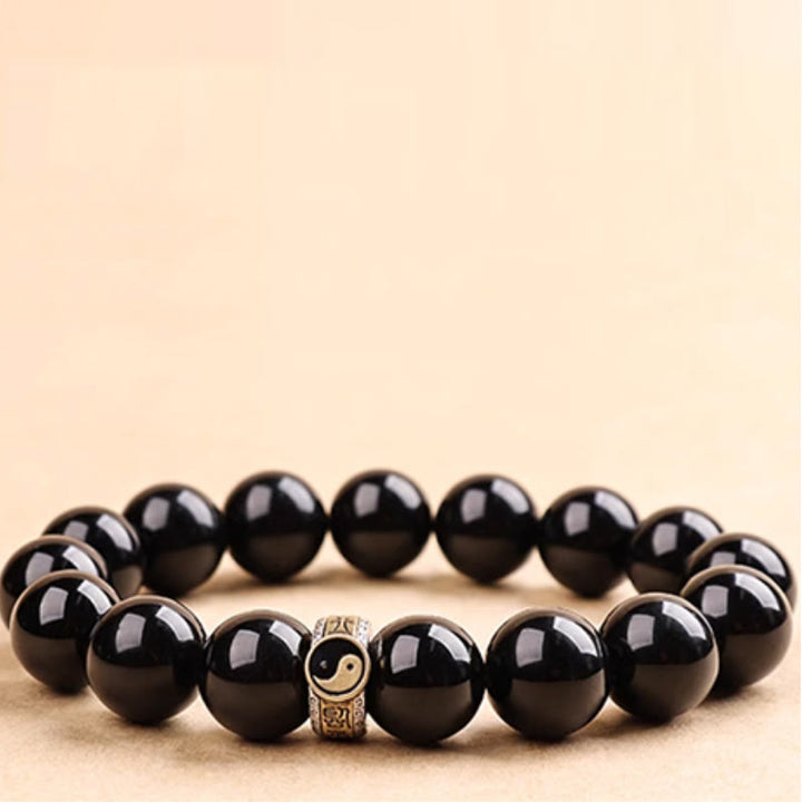 Braccialetto di adempimento del mantra dei nove caratteri Yin Yang in ossidiana nera Buddha Stones