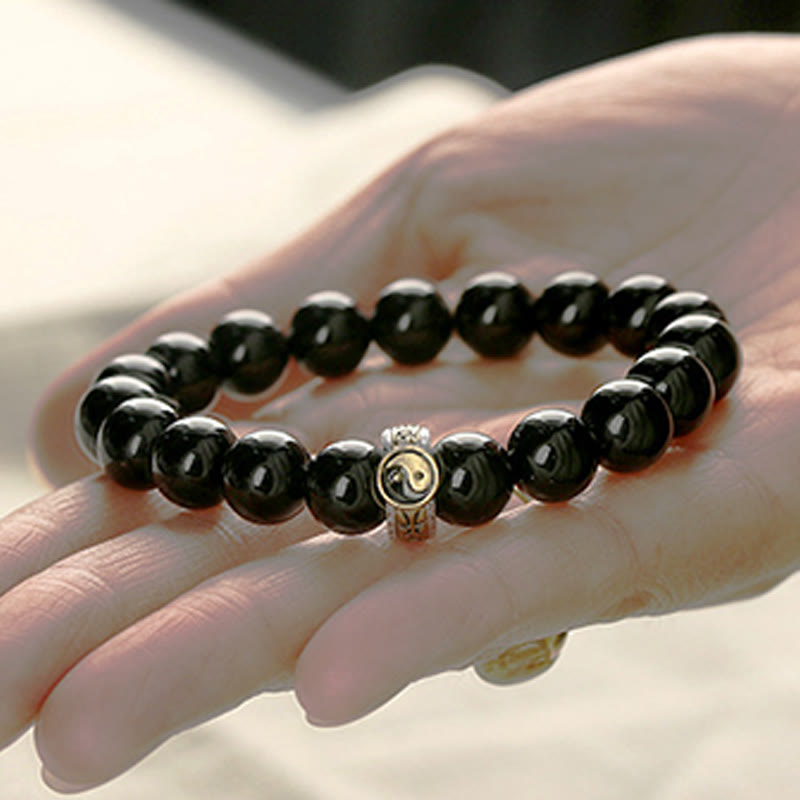 Braccialetto di adempimento del mantra dei nove caratteri Yin Yang in ossidiana nera Buddha Stones