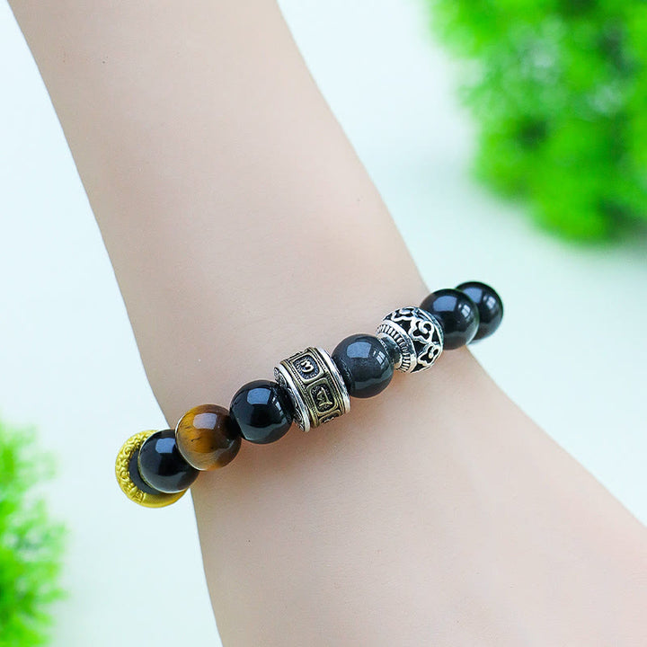 Bracciale di protezione Om Mani Padme Hum in ossidiana lucida color argento Buddha Stones