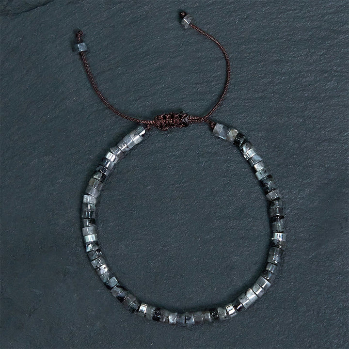 Bracciale con perline distanziatrici in pietra nera naturale con glitter Buddha Stones