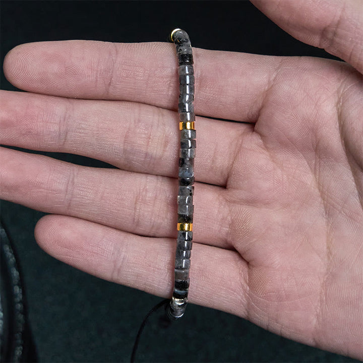Bracciale con perline distanziatrici in pietra nera naturale con glitter Buddha Stones