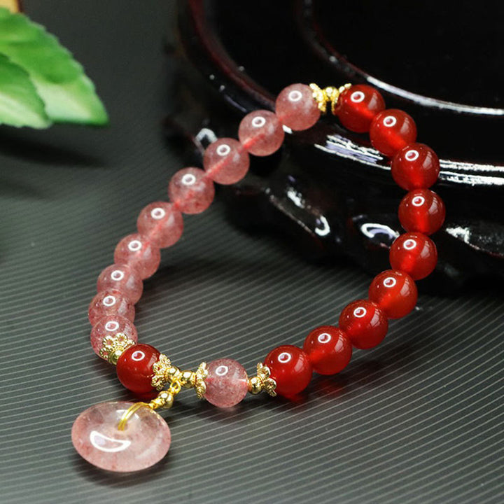 Bracciale Buddha Stones con quarzo fragola e agata rossa, fibbia della pace e fortuna positiva