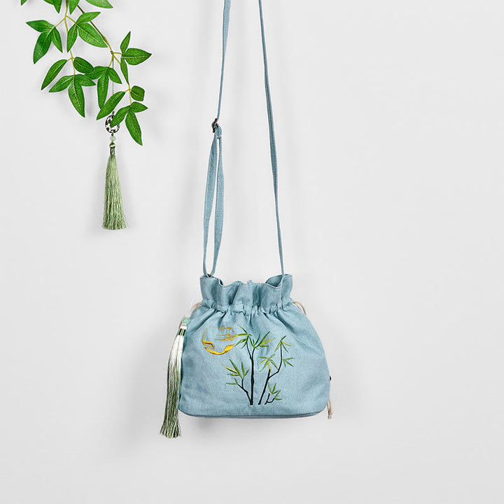 Borsa a tracolla in lino e cotone di bambù verde ricamata con Buddha Stones