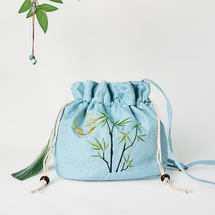 Borsa a tracolla in lino e cotone di bambù verde ricamata con Buddha Stones