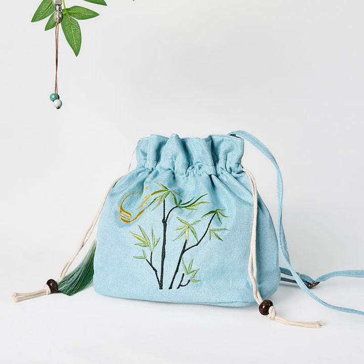Borsa a tracolla in lino e cotone di bambù verde ricamata con Buddha Stones