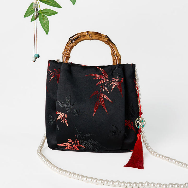 Borsa a tracolla con tracolla in perle, manico in bambù, in poliestere e cotone ricamato con Buddha Stones