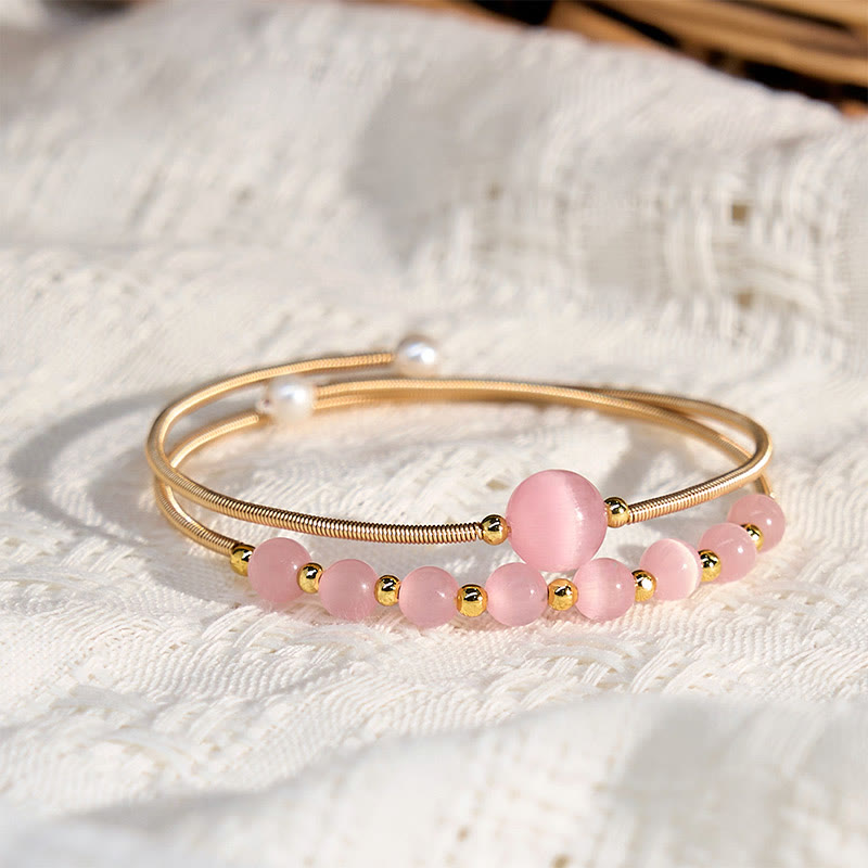 Bracciale rigido in metallo con supporto per occhio di gatto rosa in rame riempito d'oro 14K Buddha Stones