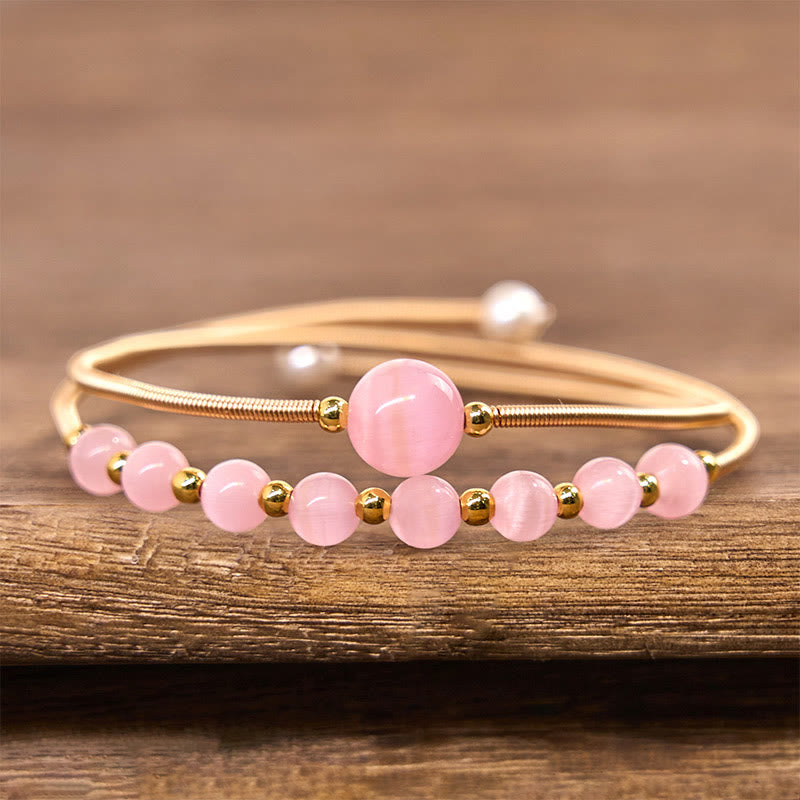 Bracciale rigido in metallo con supporto per occhio di gatto rosa in rame riempito d'oro 14K Buddha Stones