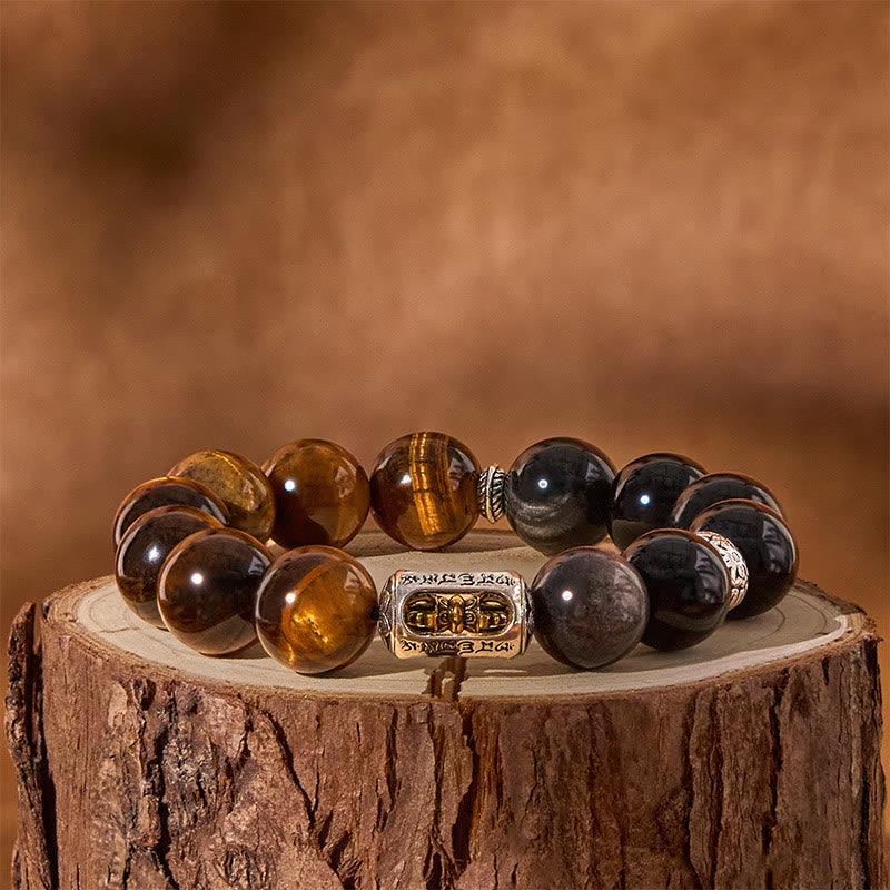 Bracciale di protezione Vajra in ossidiana naturale con occhio di tigre e argento lucido Buddha Stones