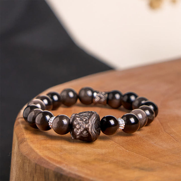 Bracciale di protezione della danza del leone in ossidiana lucida e argento naturale Buddha Stones