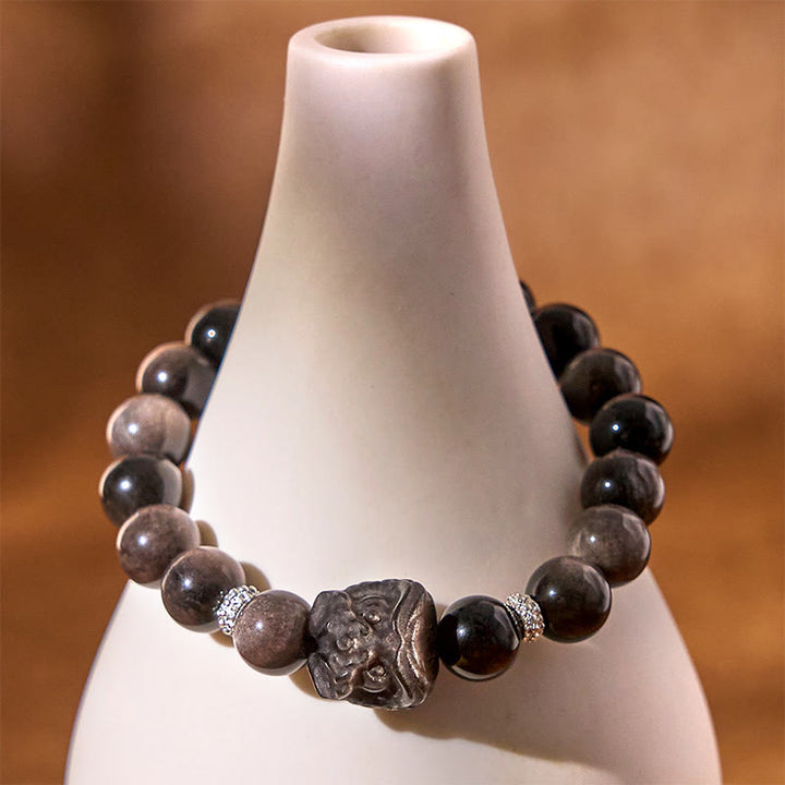 Bracciale di protezione della danza del leone in ossidiana lucida e argento naturale Buddha Stones