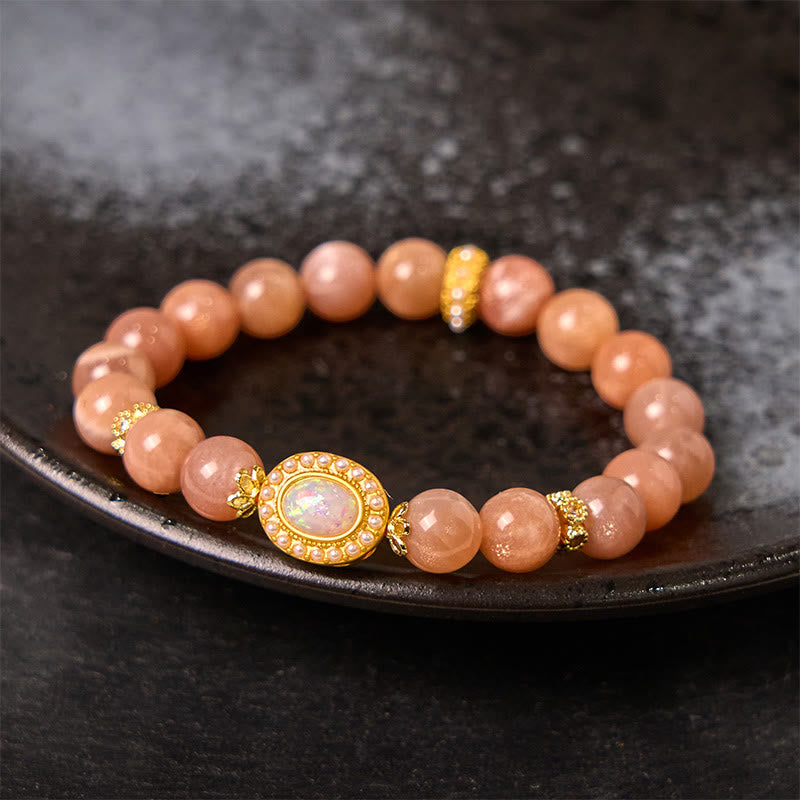 Braccialetto regolabile e rilassante Buddha Stones in pietra di luna naturale color pesca