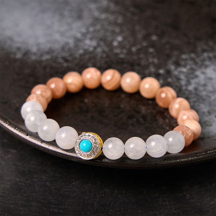 Braccialetto rilassante Buddha Stones in pietra di luna naturale color pesca e acquamarina