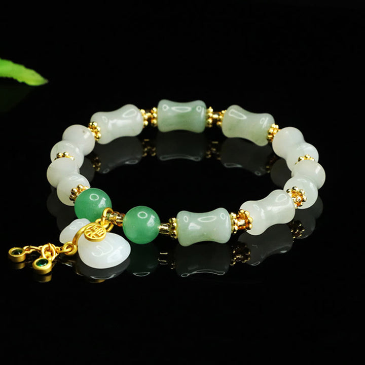 Bracciale della prosperità con motivo a sacchetto di denaro con carattere Fu in giada naturale Tianshan Buddha Stones
