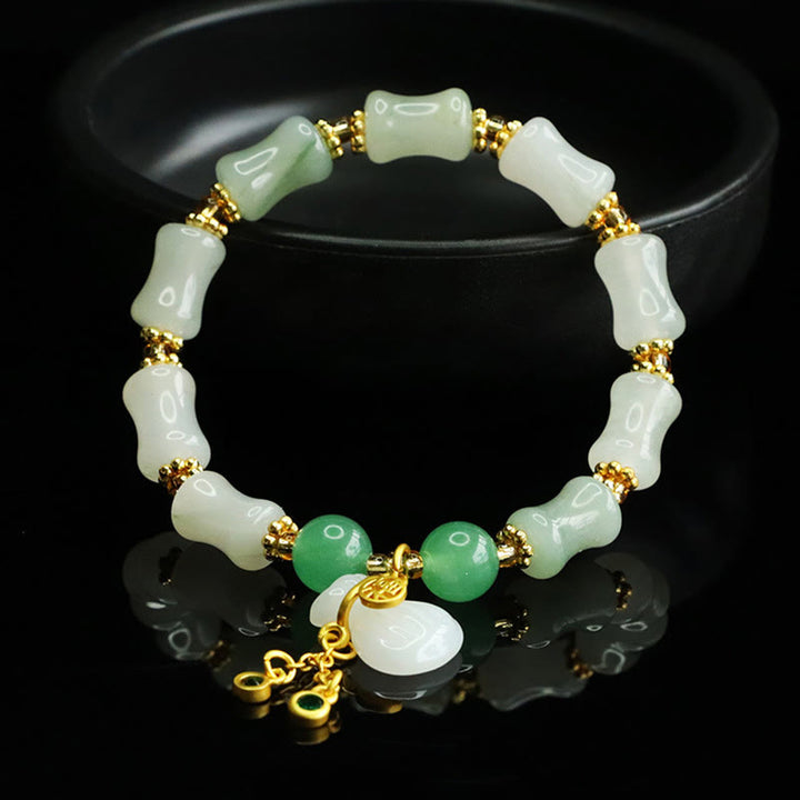 Bracciale della prosperità con motivo a sacchetto di denaro con carattere Fu in giada naturale Tianshan Buddha Stones