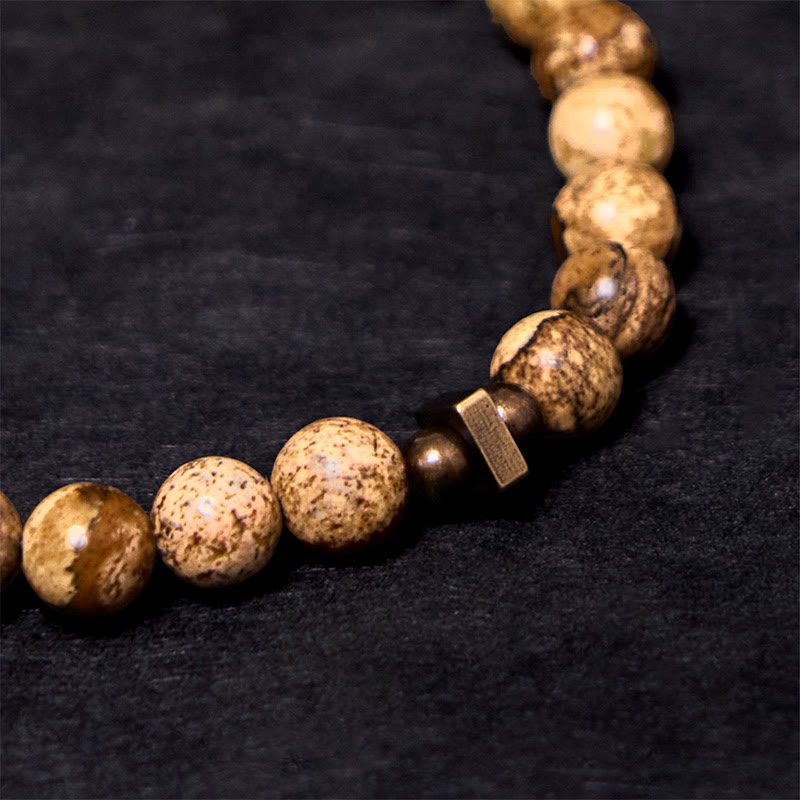 Braccialetto portafortuna in rame con design anticato Buddha Stones