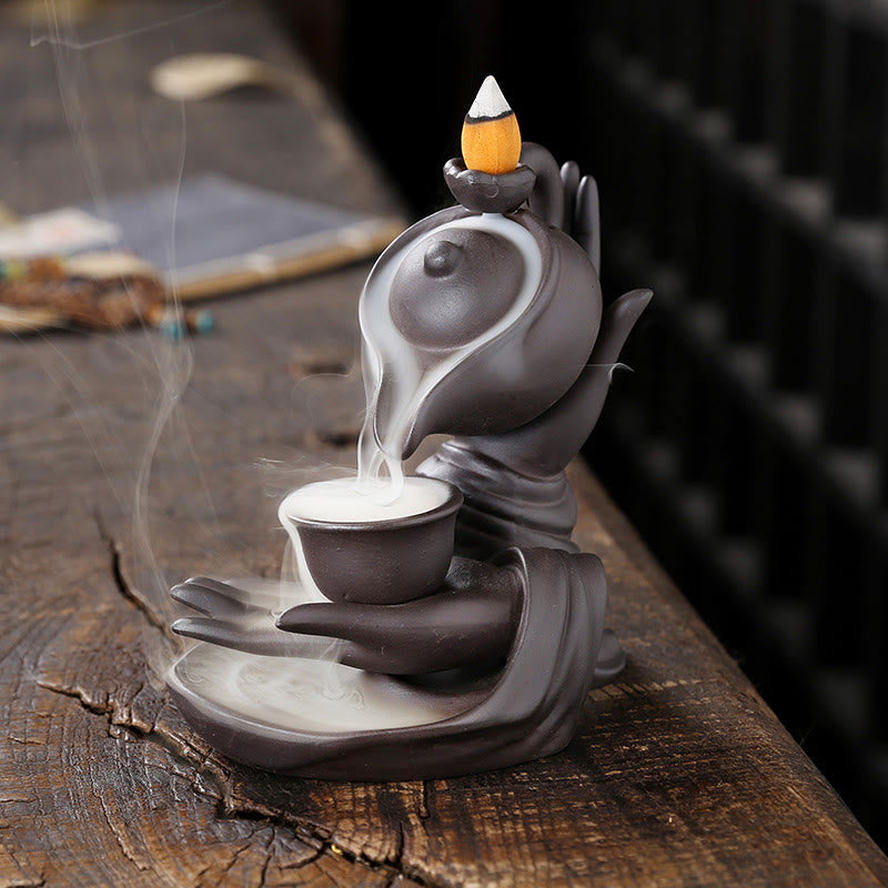 Buddha Stones, mano di Buddha che tiene teiera, tazza, fontana di fumo a riflusso in ceramica, bruciatore di incenso curativo, decorazione - Marrone Nero 13,7*9*13,9cm - image 0