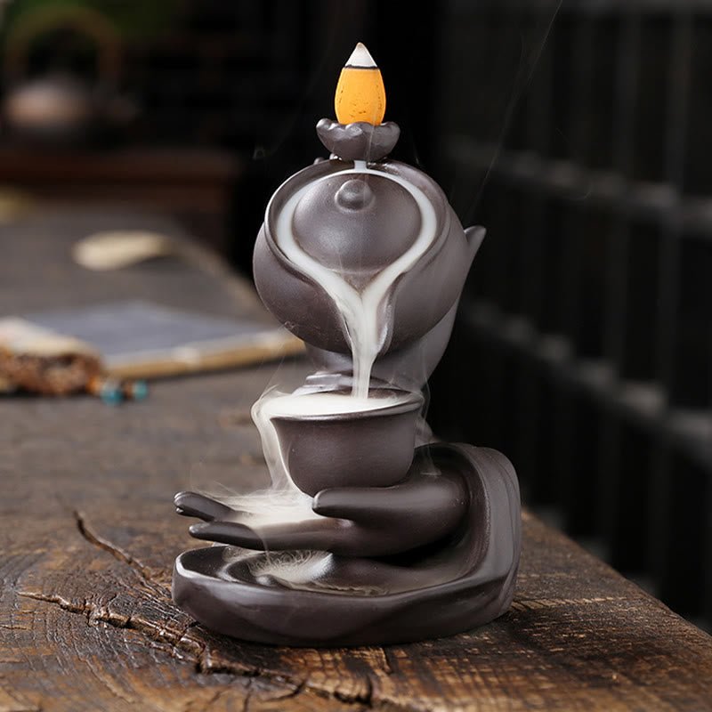 Buddha Stones, mano di Buddha che tiene teiera, tazza, fontana di fumo a riflusso in ceramica, bruciatore di incenso curativo, decorazione - image 1