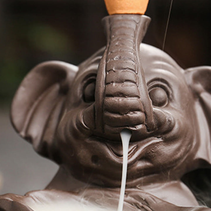 Buddha Stones, piccolo elefante che tiene una foglia, argilla viola, fontana di fumo a riflusso, bruciatore di incenso curativo, decorazione - image 10