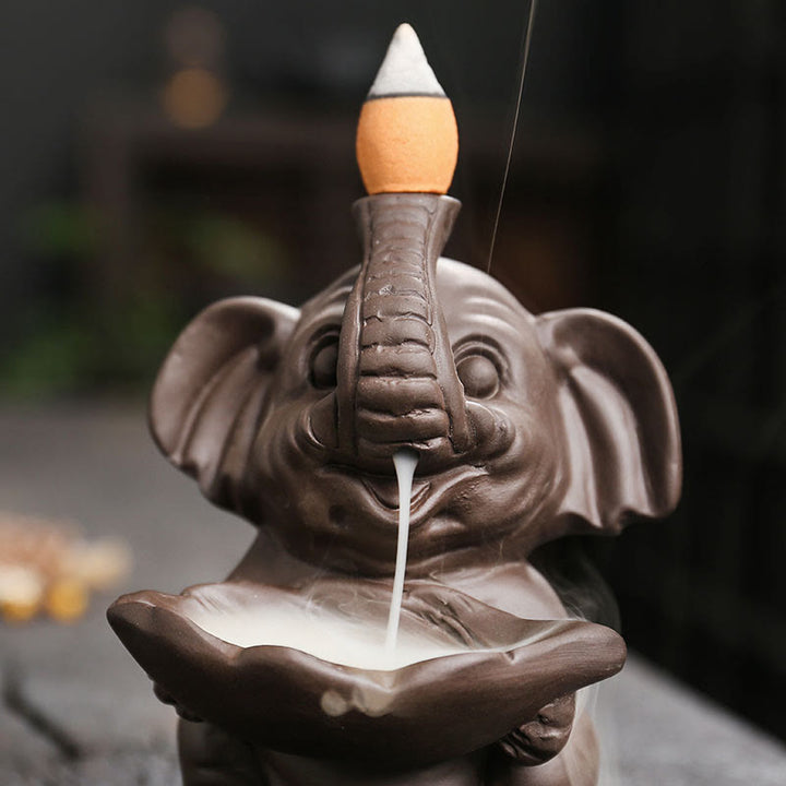 Buddha Stones, piccolo elefante che tiene una foglia, argilla viola, fontana di fumo a riflusso, bruciatore di incenso curativo, decorazione - image 9