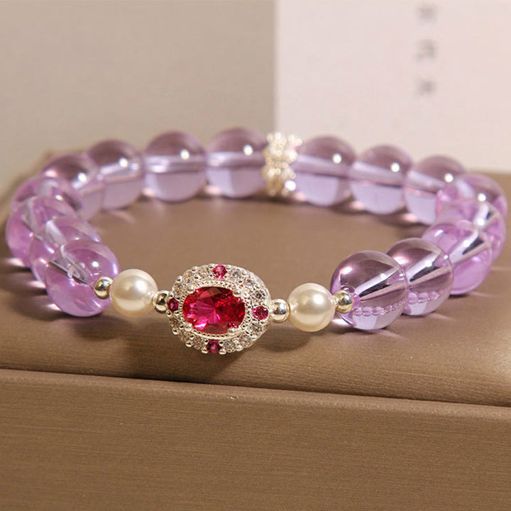 Bracciale Buddha Stones con pietre naturali, ametista, perla e zircone rosso - image 2