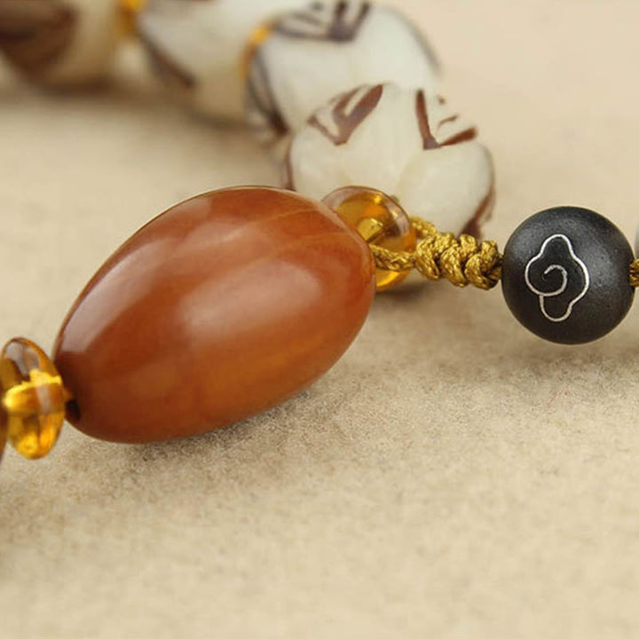 Buddha Stones Bracciale tibetano Mala con semi di Bodhi bianchi e pace - image 14