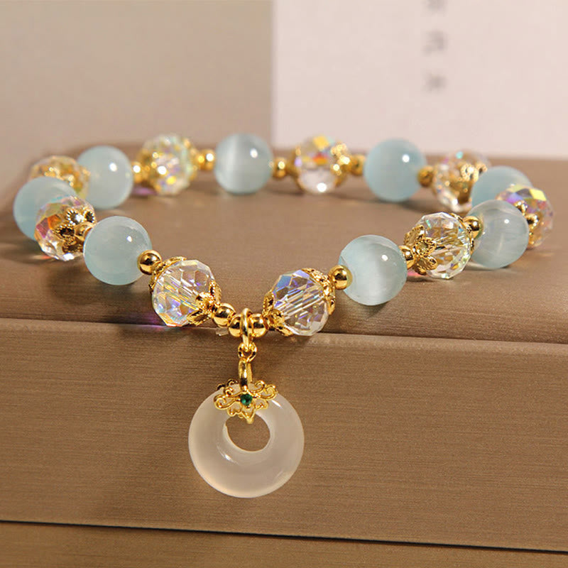 Braccialetto dell'equilibrio con fibbia della pace in cristallo bianco e Buddha Stones blu occhio di gatto - image 2