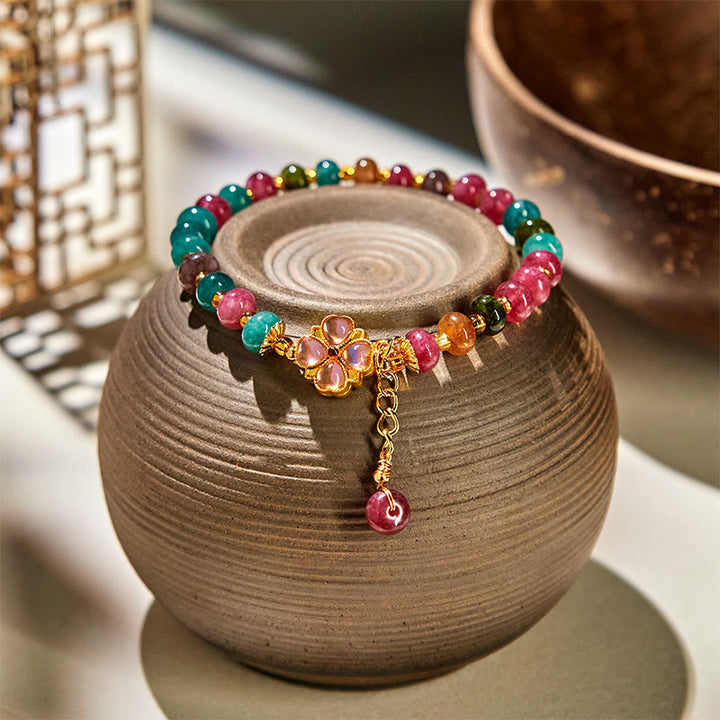 Bracciale dell'amore con fiore a quadrifoglio e tormalina Buddha Stones