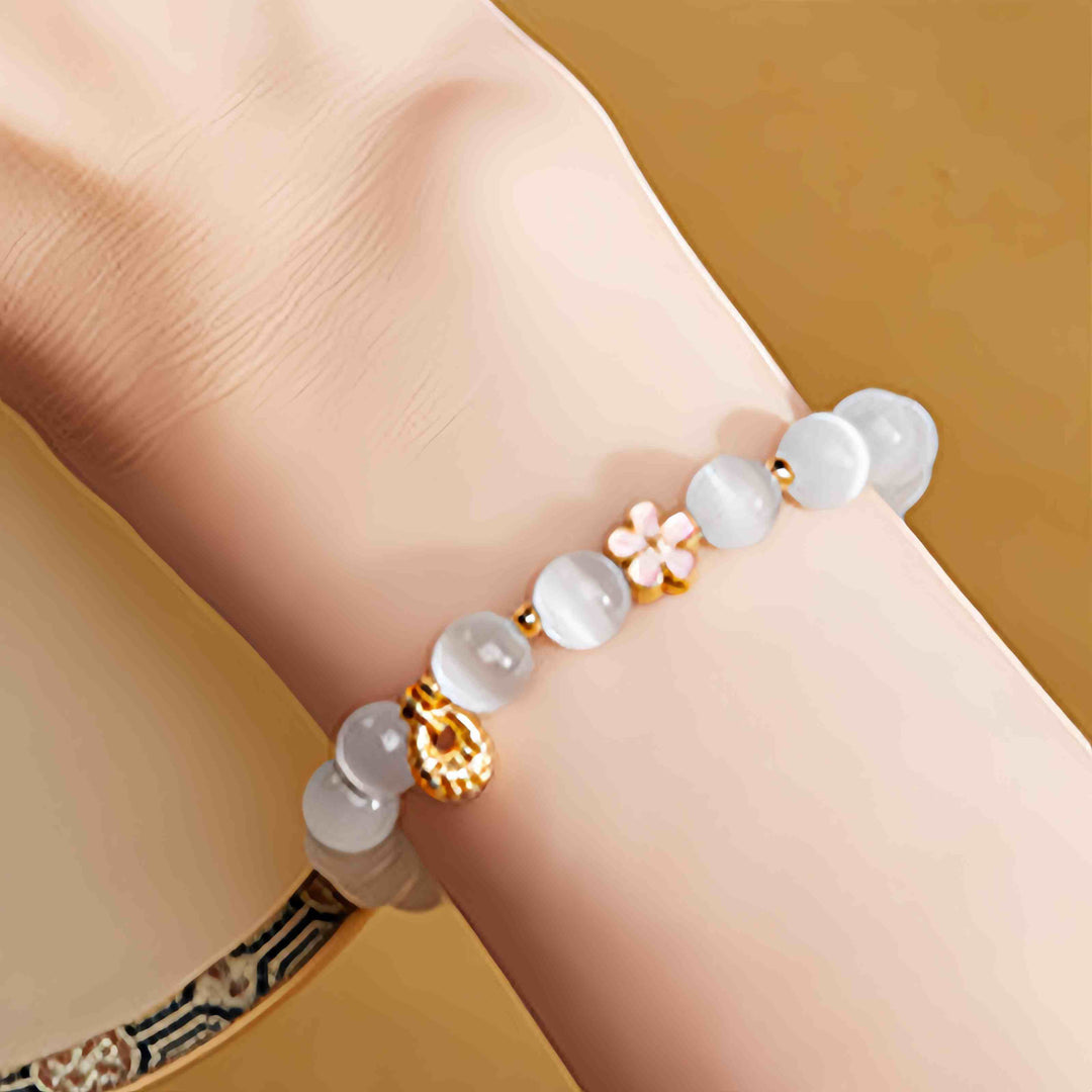 Buddha Stones Braccialetto portafortuna in argento sterling 925 con fiore di pesco e occhio di gatto bianco - image 9