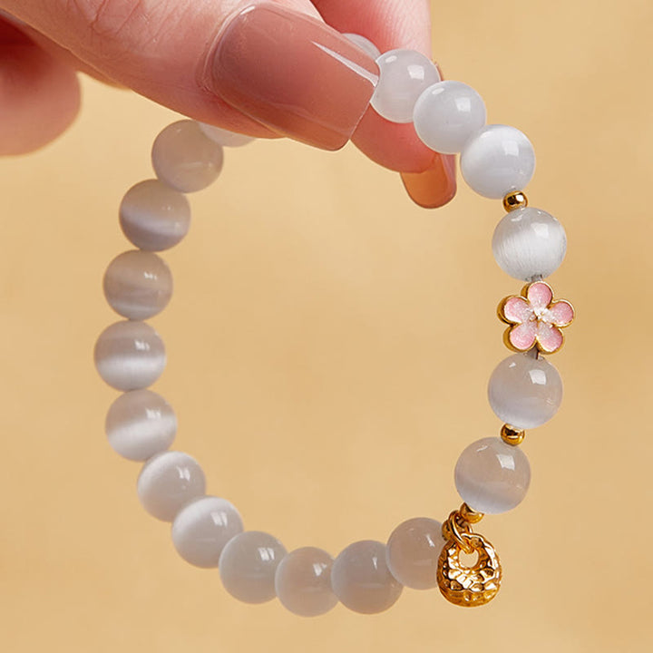 Buddha Stones Braccialetto portafortuna in argento sterling 925 con fiore di pesco e occhio di gatto bianco - image 3