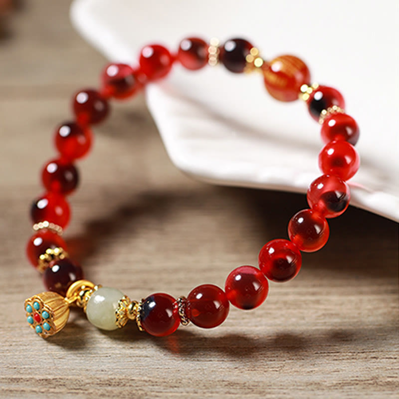 Braccialetto curativo con baccello di loto dorato in agata caramellata naturale colorata Buddha Stones - image 18