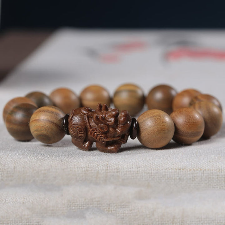 Buddha Stones Bracciale Pixiu Attract Wealth in legno di sandalo verde - image 4
